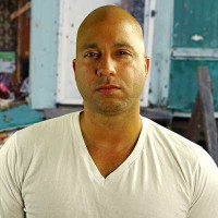 Kyle Ferguson Muscular man with a shaved head